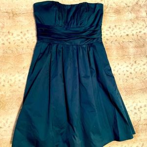 Strapless, knee-length teal party dress from David’s bridal.